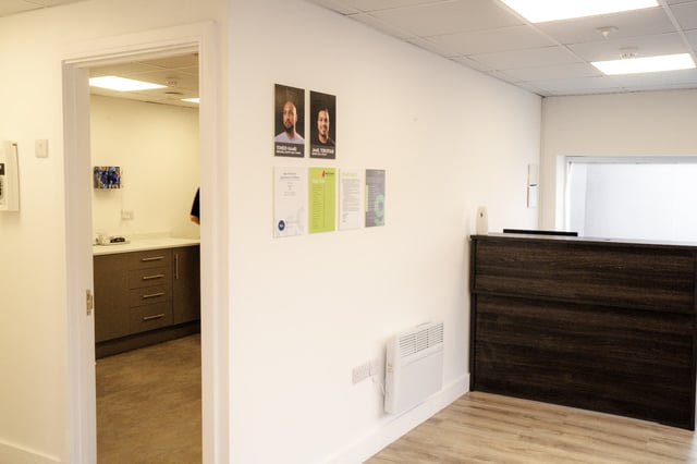 The glass reception desk at BDSI Clinic, Staple Hill, Bristol